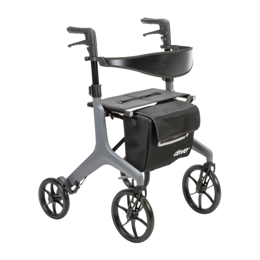 The Drive AeroCarbon Ultra-Lite Rollator features four large wheels, adjustable handles, a black seat, and a front black storage bag, offering modern and lightweight mobility assistance.
